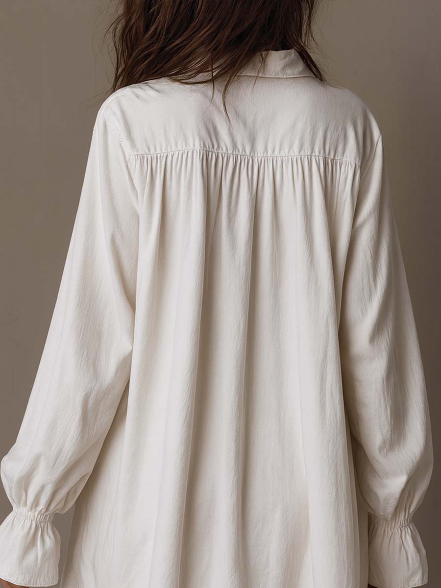 Amparo – Langärmliges Hemdkleid mit unregelmäßigem Saum