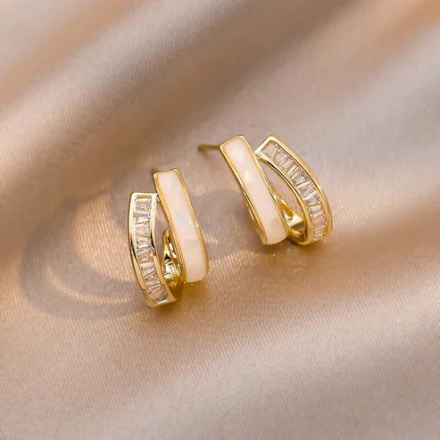 1 +1 Gratis - Nuria Ohrringe - 18K Gold