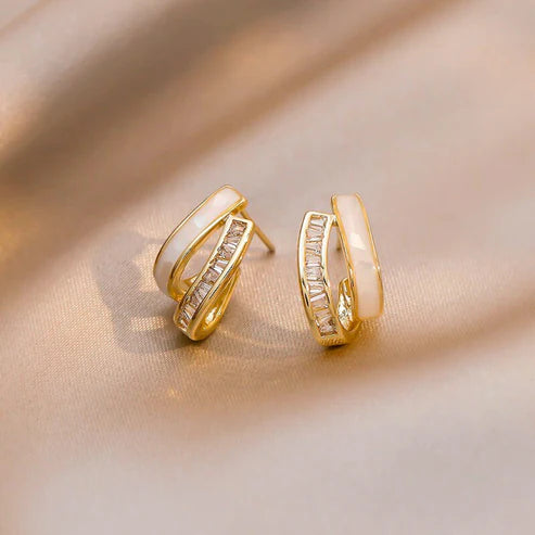 1 +1 Gratis - Nuria Ohrringe - 18K Gold