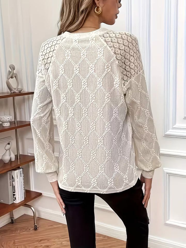 Meena – Grenzüberschreitende Bluse mit Rundhalsausschnitt