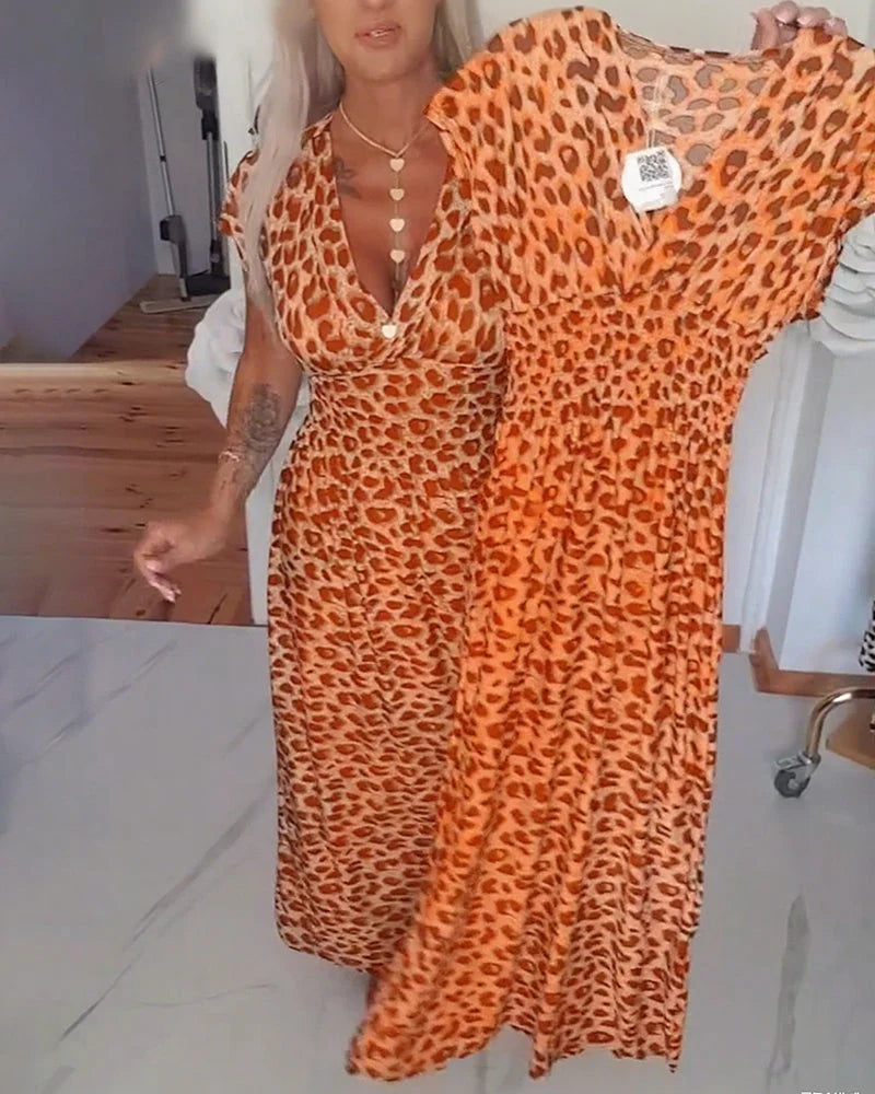 Erendira – Elegantes Kleid Mit V-Ausschnitt Und Leopardenmuster