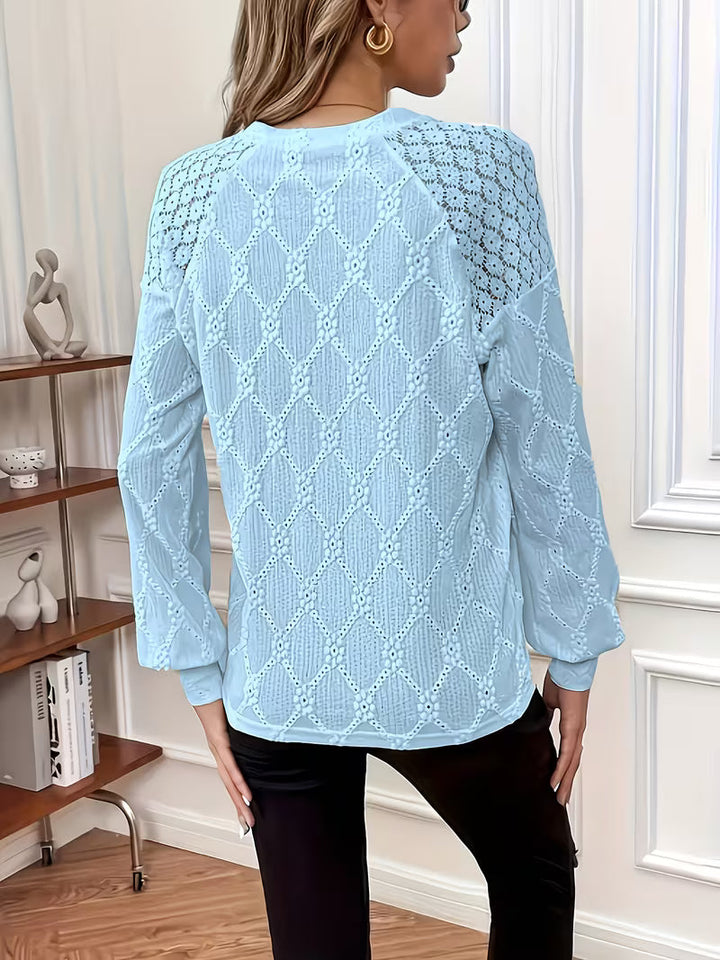 Meena – Grenzüberschreitende Bluse mit Rundhalsausschnitt