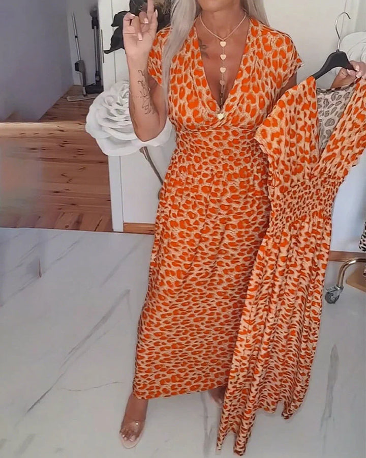 Erendira – Elegantes Kleid Mit V-Ausschnitt Und Leopardenmuster