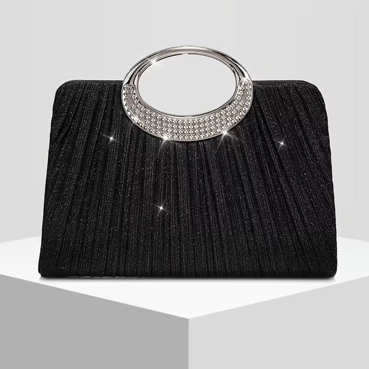 Lizzana – Glänzende, Runde, Plissierte Handtasche Mit Ringverschluss