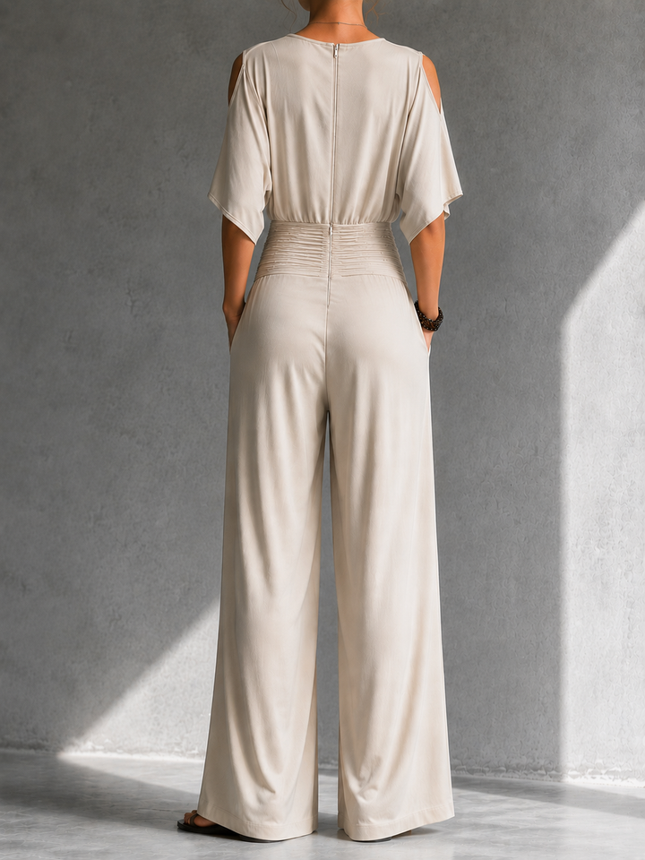 Greene – Jumpsuit mit Wickelausschnitt, Cold-Shoulder-Details und weitem Bein