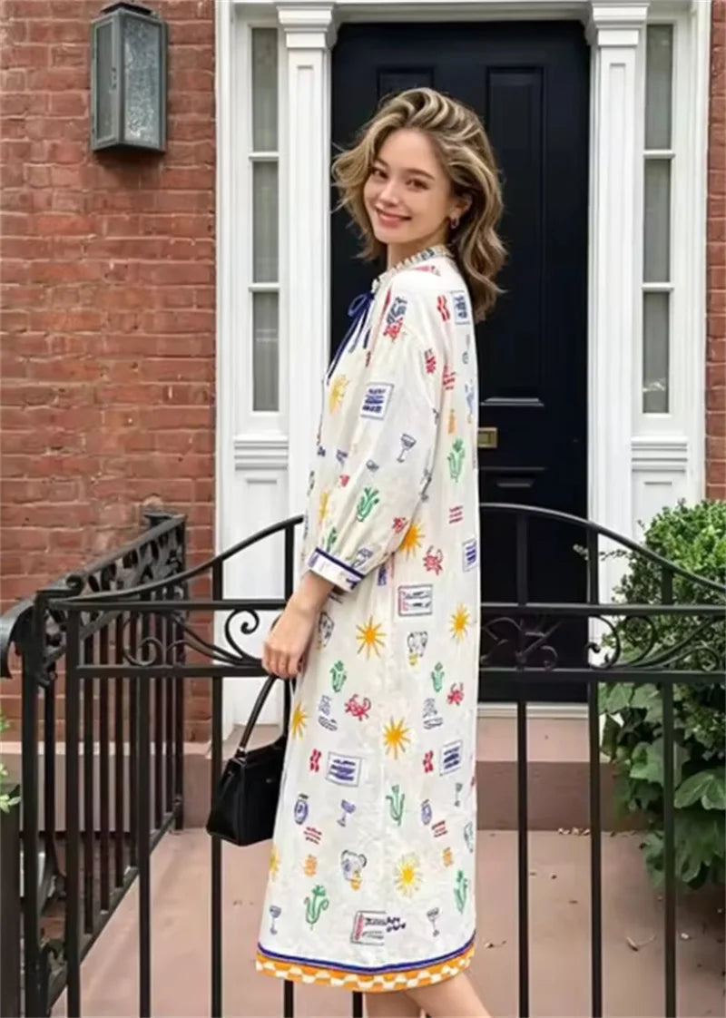 Maris – Langes Kleid mit Print und Ärmeln