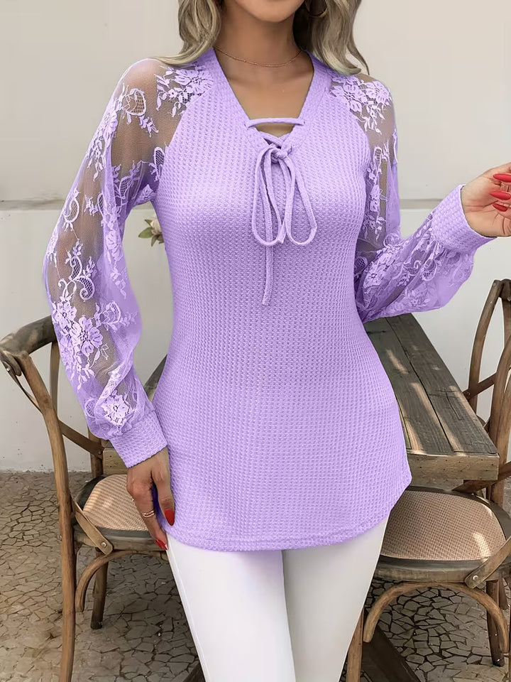 Wazina – Elegantes Oberteil Mit Halbtransparenter Spitze