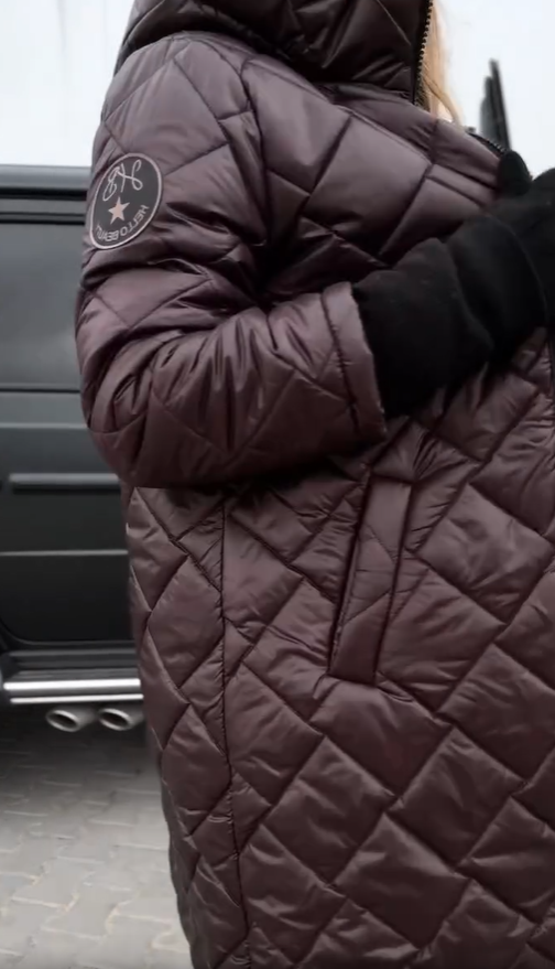 Kureha - Stylische Gesteppte Kapuzenjacke Mit Reißverschluss
