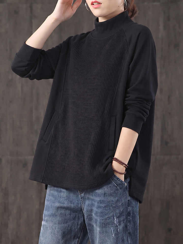 Safia – Oversize Bluse mit Rollkragen