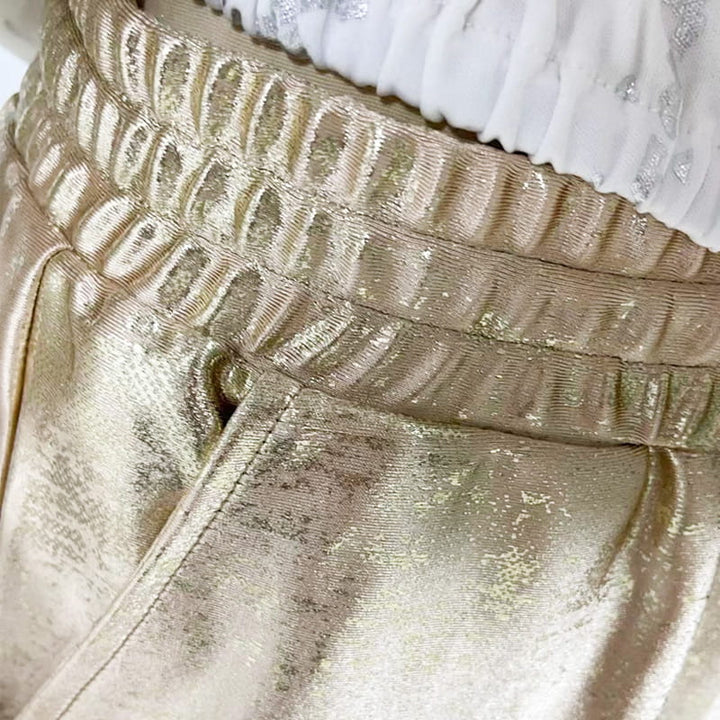 Ashley - Top und Der Teufel Auge Pailletten Hose